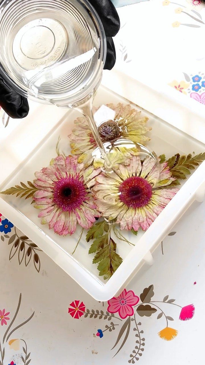 Artist working with resin